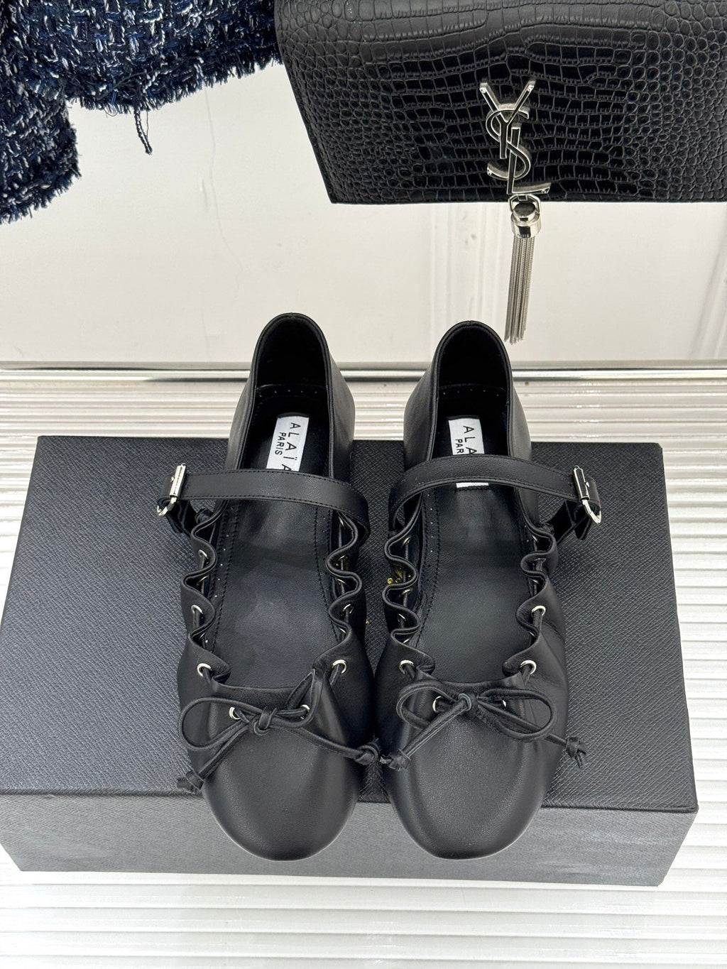 ALAIA 26S MARY JANE FLATS IN BLACK LAMBSKIN WITH BOW