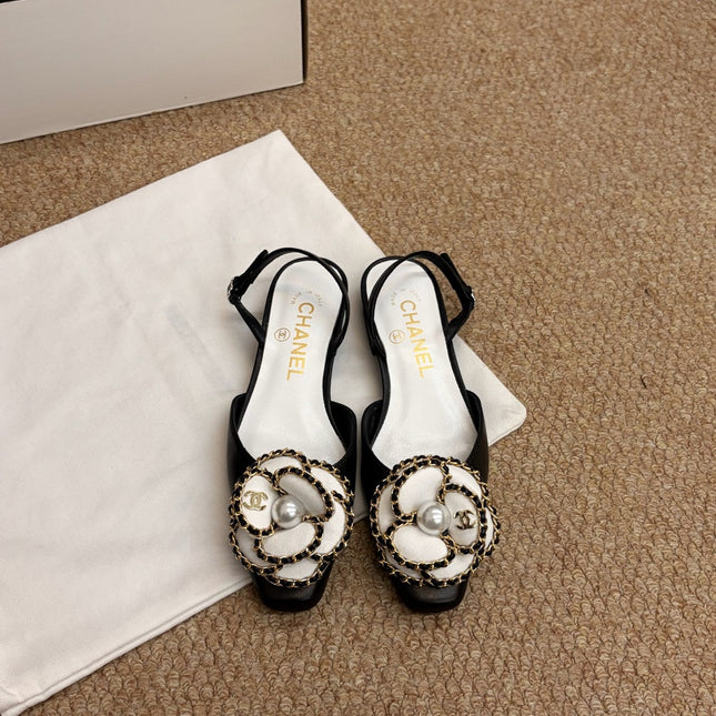 CHANEL 26S SLINGBACK FLATS IN BLACK CALFSKIN CAMELLIA PEARL