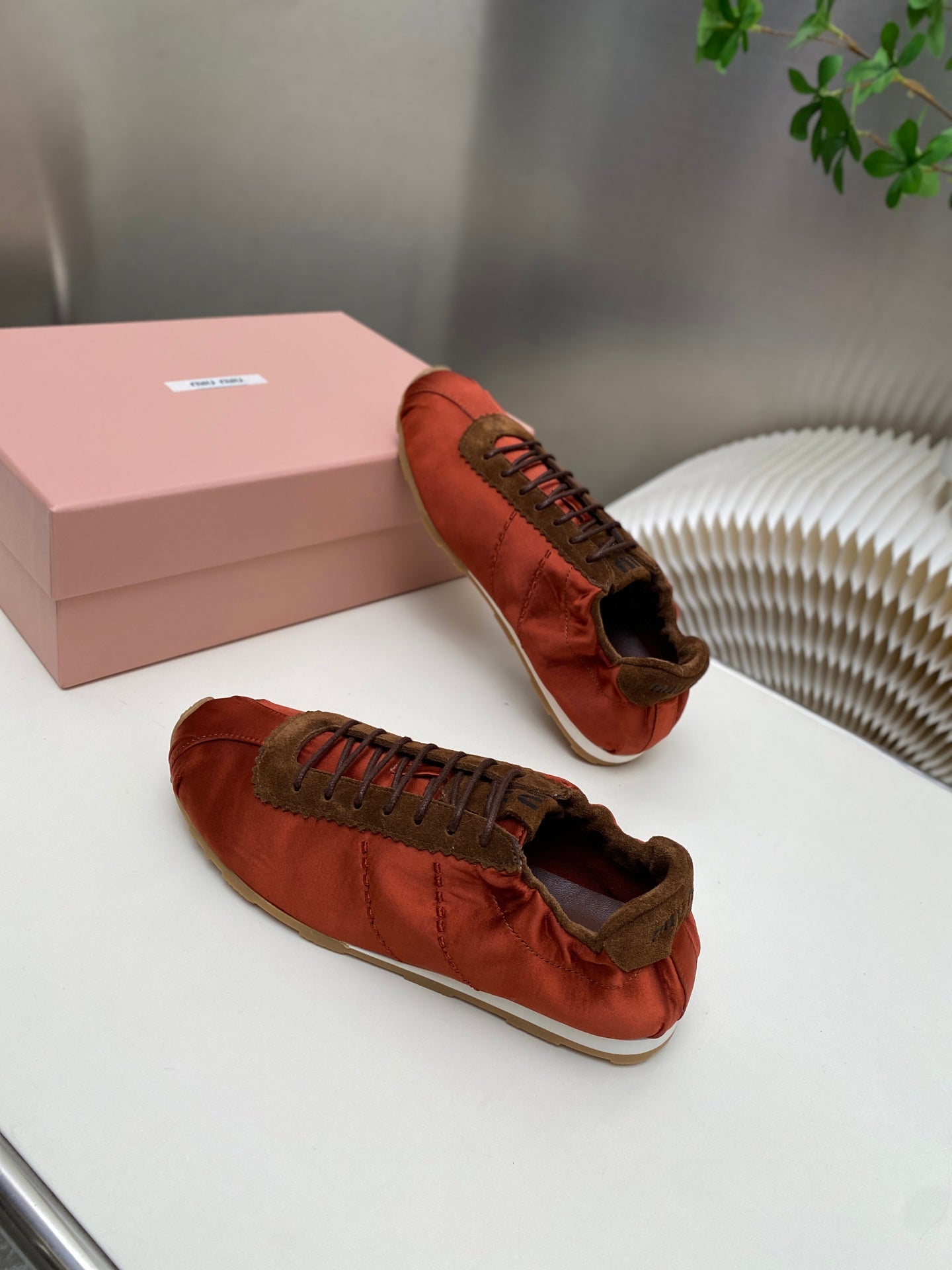 MIUMIU 26S SNEAKERS IN RUST RED PLUME SATIN