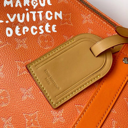 LV 26S KEEPALL 50 IN ORANGE MONOGRAM CANVAS