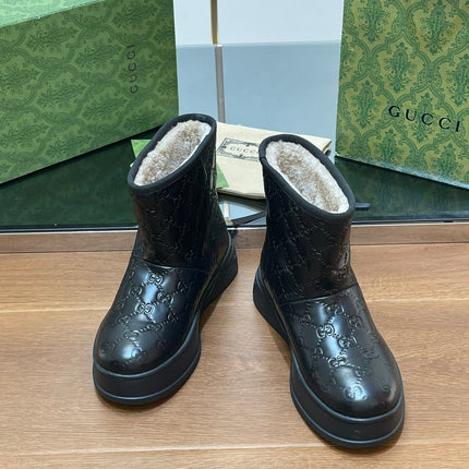 GG UGG BOOTS IN BLACK EMBOSSED DEERSKIN AND BEIGE WOOL LINING