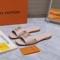 LV 26S FLAT SLIDE SANDALS IN NUDE PINK CALFSKIN GOLD HARDWARE