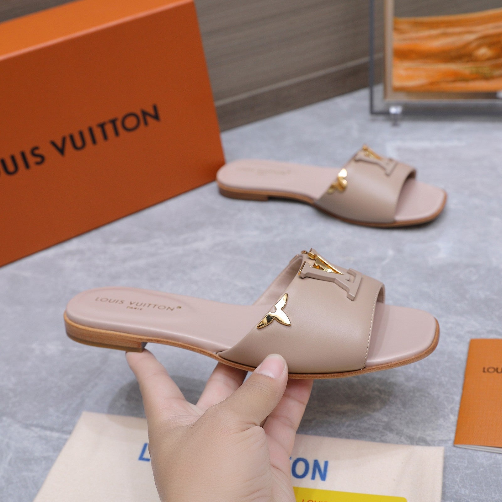 LV 26S FLAT SLIDE SANDALS IN NUDE PINK CALFSKIN GOLD HARDWARE