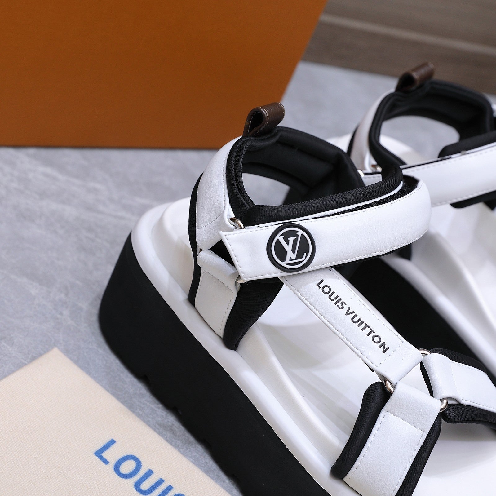 LV 26S CHAMELEON PLATFORM SANDALS 60MM IN WHITE CALFSKIN AND EVA