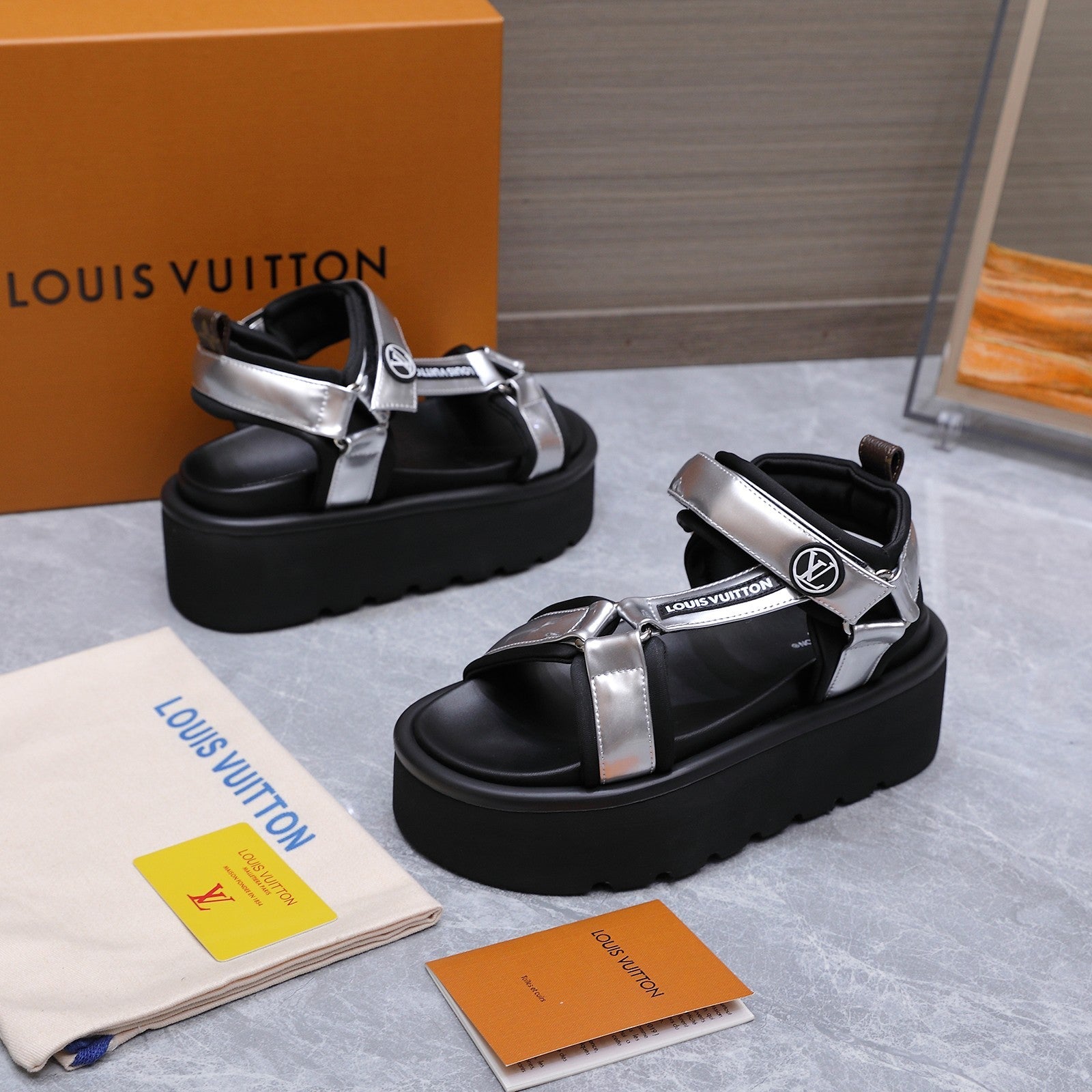 LV 26S CHAMELEON PLATFORM SANDALS 60MM IN SILVER AND BLACK CALFSKIN AND EVA