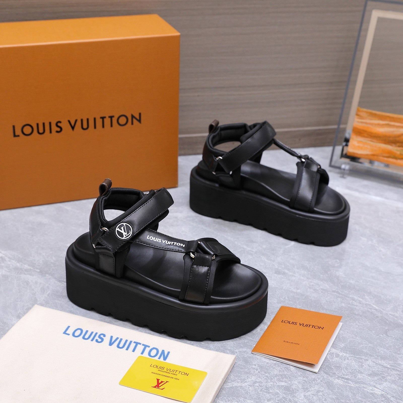 LV 26S CHAMELEON PLATFORM SANDALS 60MM IN BLACK CALFSKIN AND EVA