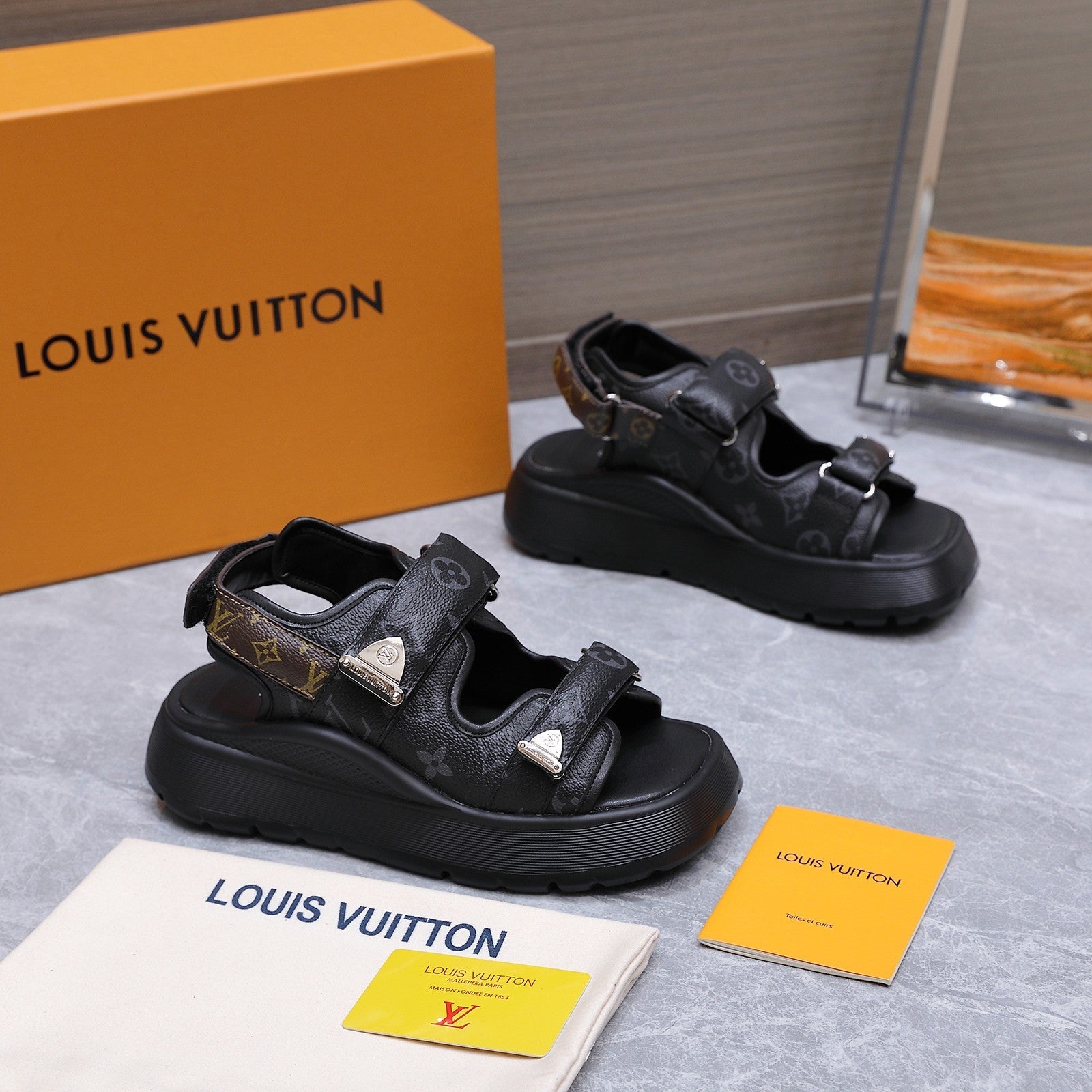 LV 26S CHAMELEON SANDALS 60MM IN BLACK MONOGRAM COATED CALFSKIN AND EVA