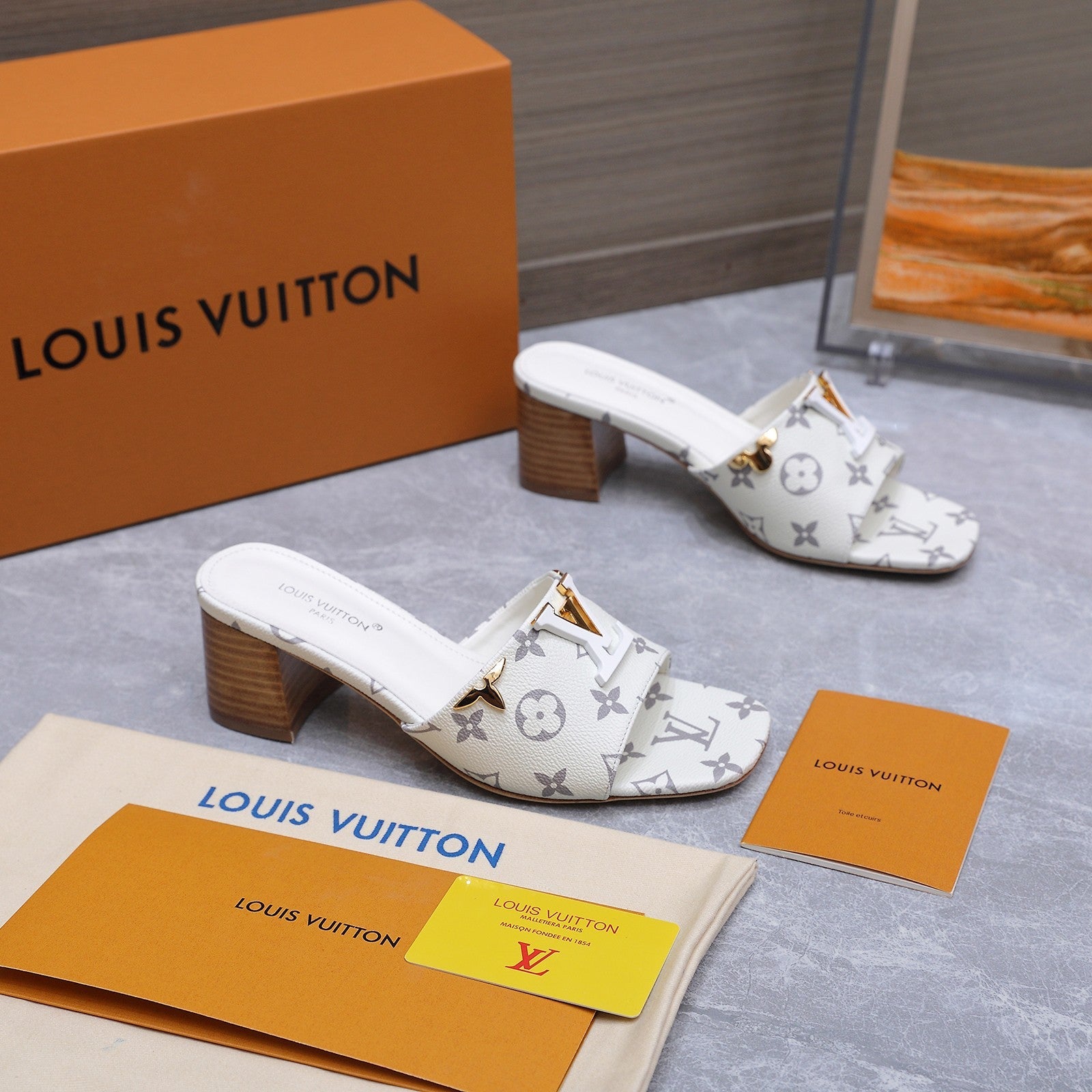 LV 26S BLOCK HEEL MULE SANDALS 55MM IN WHITE MONOGRAM CALFSKIN GOLD HARDWARE