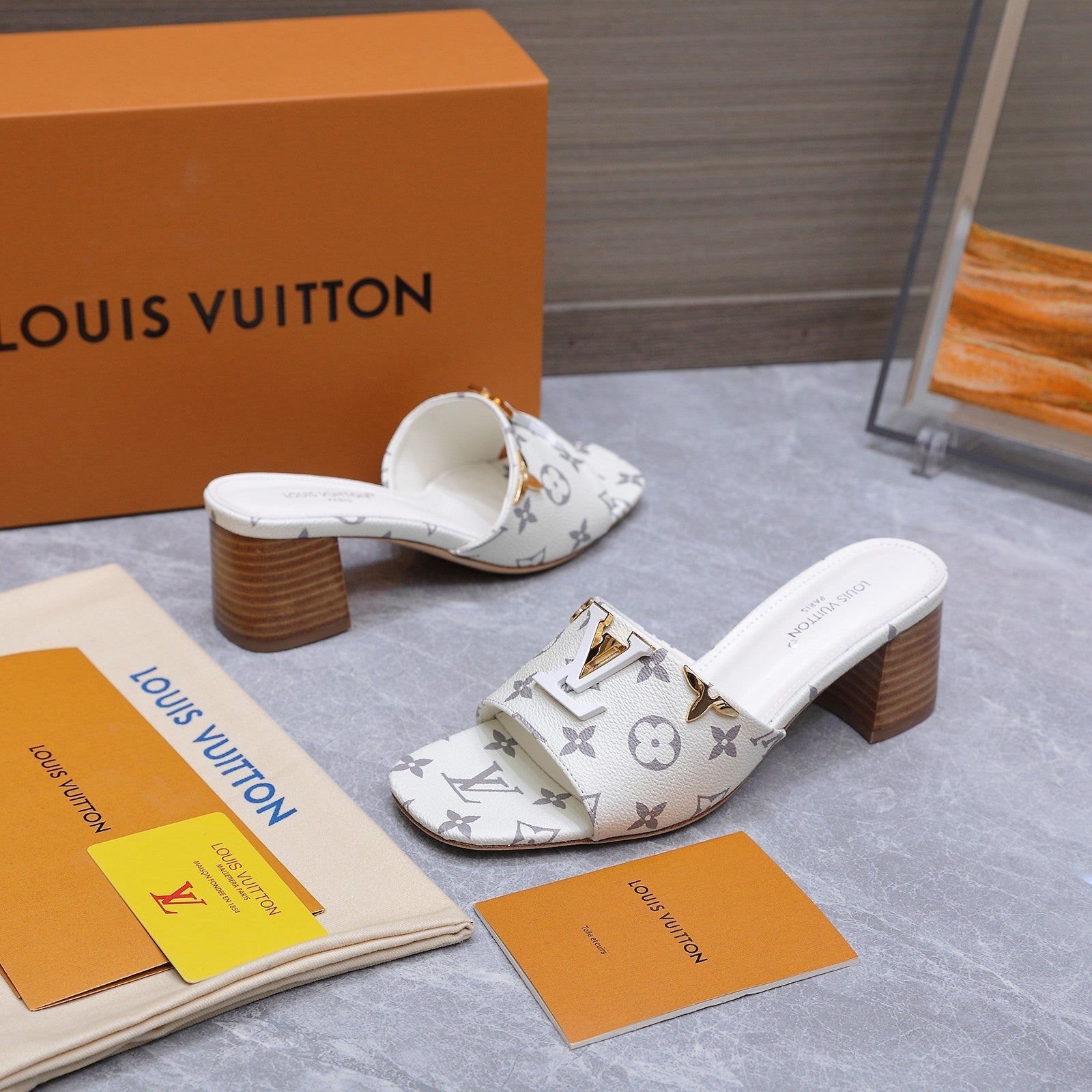 LV 26S BLOCK HEEL MULE SANDALS 55MM IN WHITE MONOGRAM CALFSKIN GOLD HARDWARE