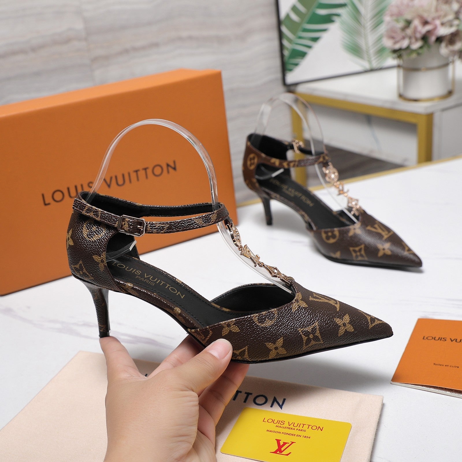 LV 26S ELEGANT T-STRAP HEELS 65MM IN DARK BROWN MONOGRAM CALFSKIN GOLD HARDWARE
