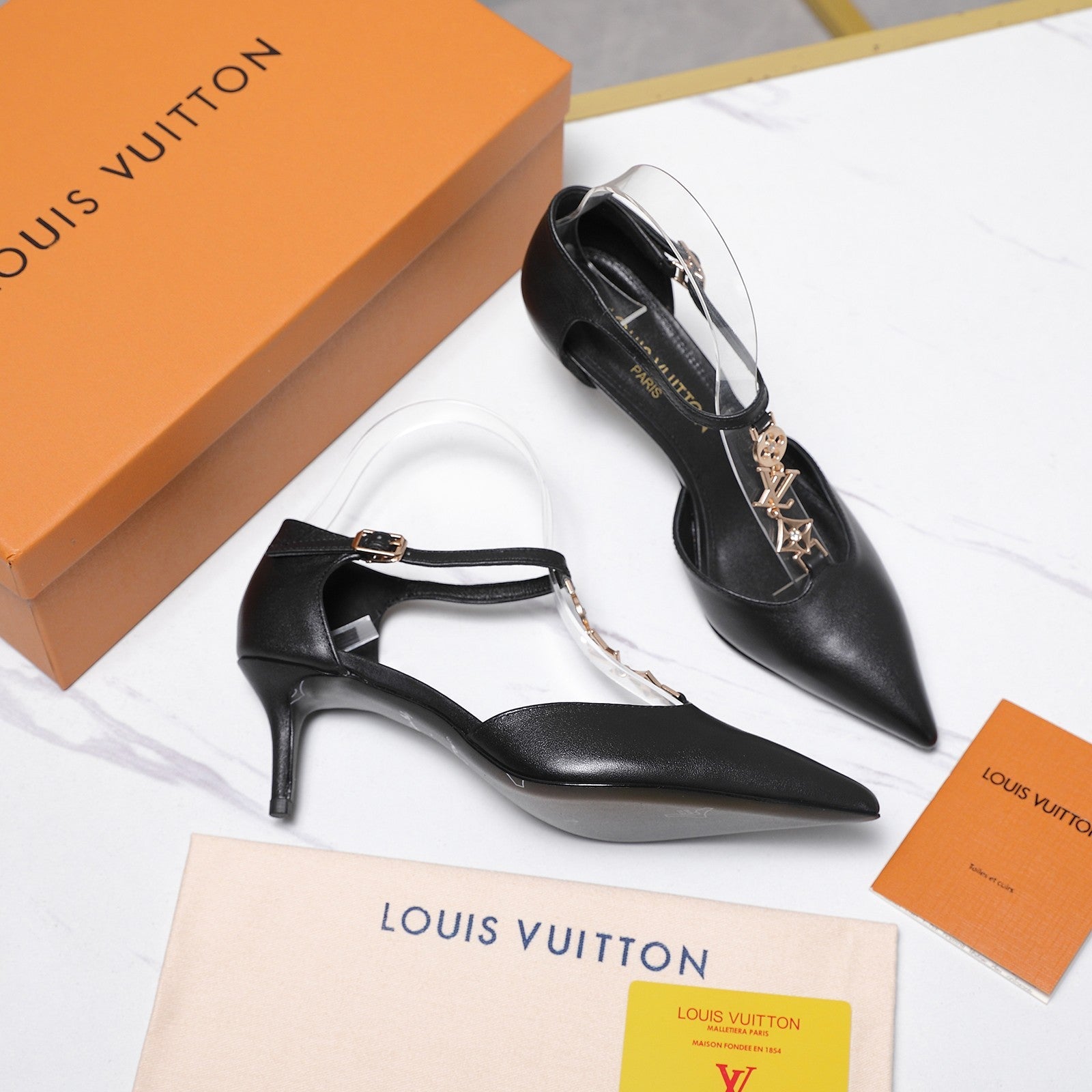 LV 26S ELEGANT T-STRAP HEELS 65MM IN BLACK CALFSKIN GOLD HARDWARE