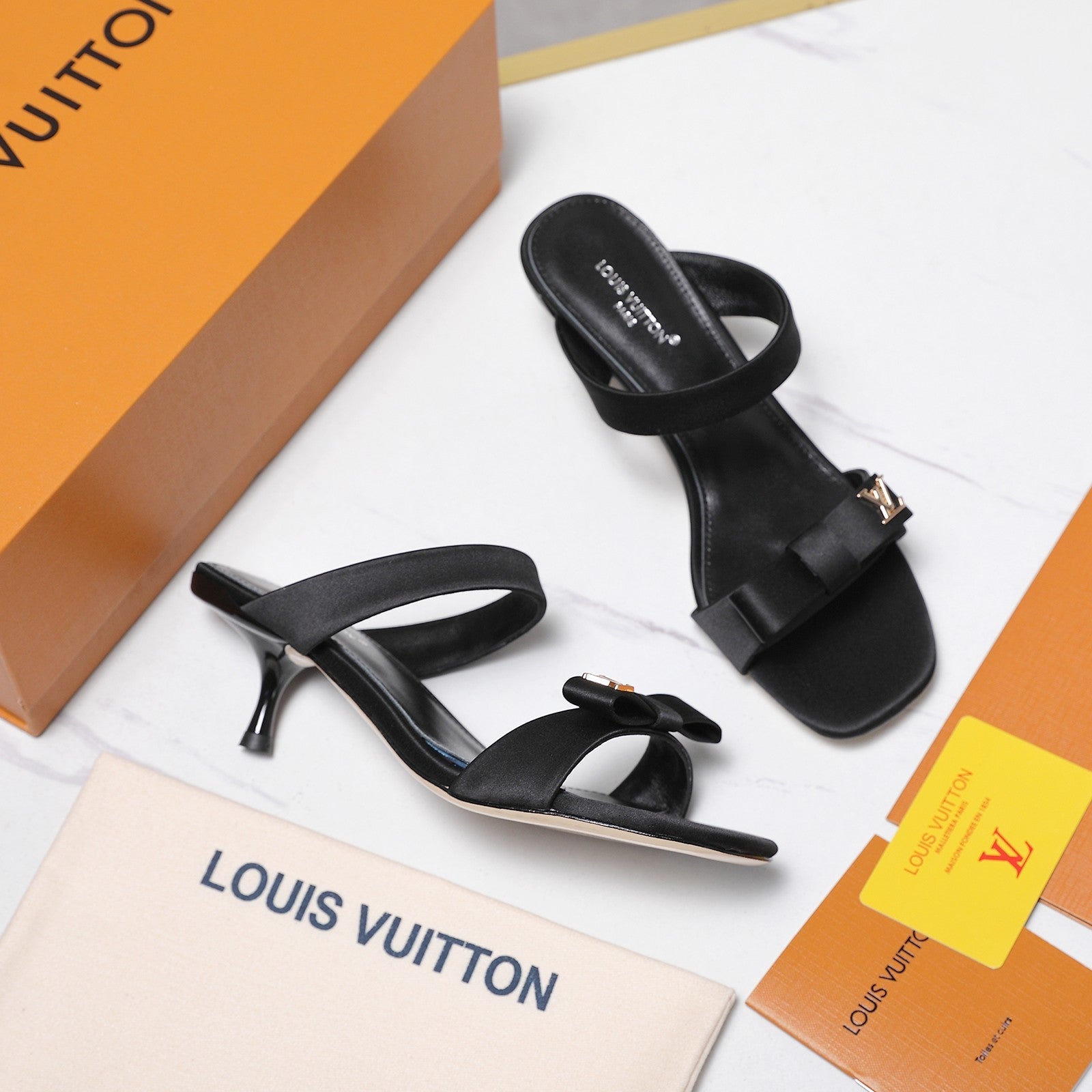 LV 26S SLIDE HEELS 40MM IN BLACK SATIN WITH BOW