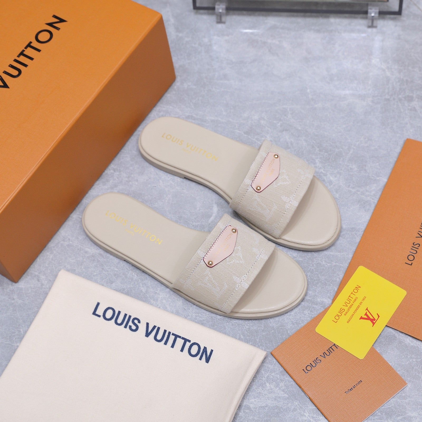 LV 26S FLAT SLIDE SANDALS IN NUDE BEIGE MONOGRAM CANVAS AND CALFSKIN
