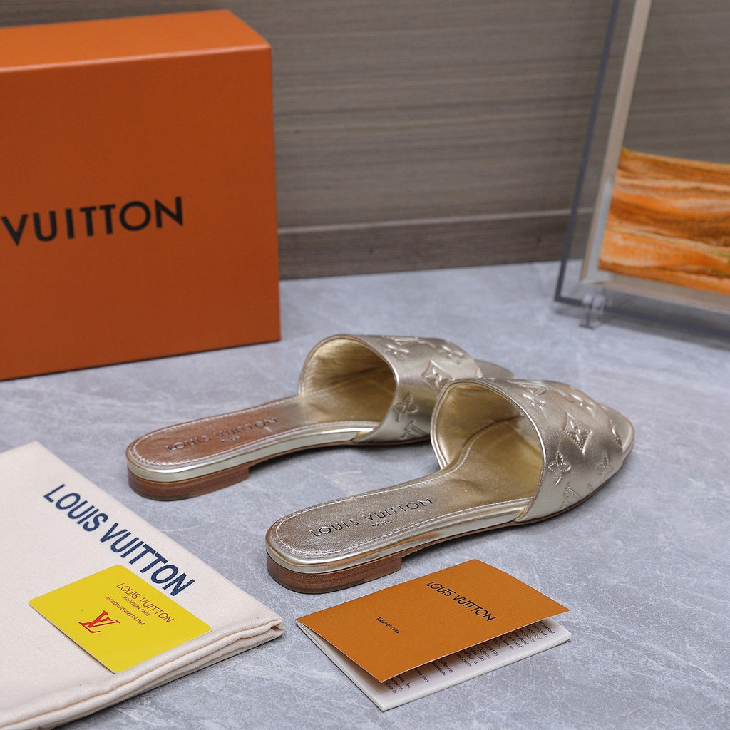 LV 26S FLAT SLIDE SANDALS IN GOLD CALFSKIN EMBOSSED MONOGRAM LOGO
