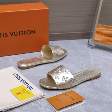 LV 26S FLAT SLIDE SANDALS IN GOLD CALFSKIN EMBOSSED MONOGRAM LOGO