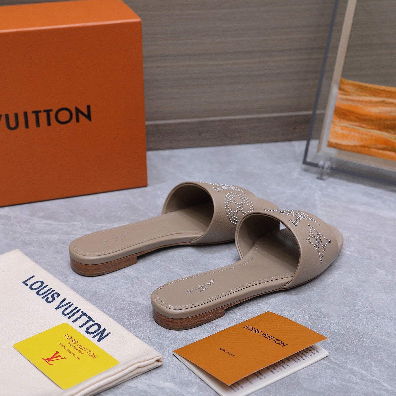 LV 26S FLAT SLIDE SANDALS IN NUDE BROWN CALFSKIN
