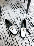 LOAFERS IN WHITE AND BLACK CALFSKIN HARDWARE WITH ROCK MIX CHAIN