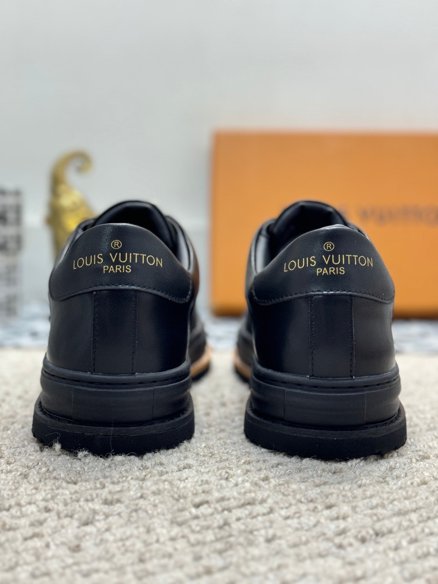 LV TRAINERS IN BLACK CALFSKIN AND JACQUARD