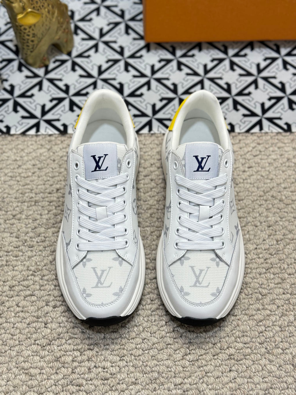 LV TRAINERS IN WHITE CALFSKIN AND JACQUARD