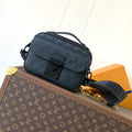 LV 26S S LOCK CROSSBODY BAG 22 IN BLACK EMBOSSED TAURILLON LEATHER