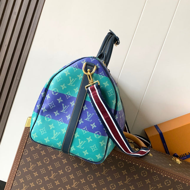 LV 26S KEEPALL 50 IN BLUE WITH LIGHT BLUE ACCENTS COATED CANVAS