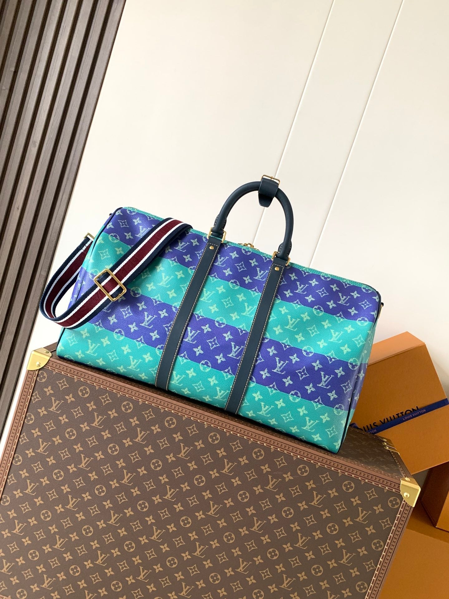 LV 26S KEEPALL 50 IN BLUE WITH LIGHT BLUE ACCENTS COATED CANVAS