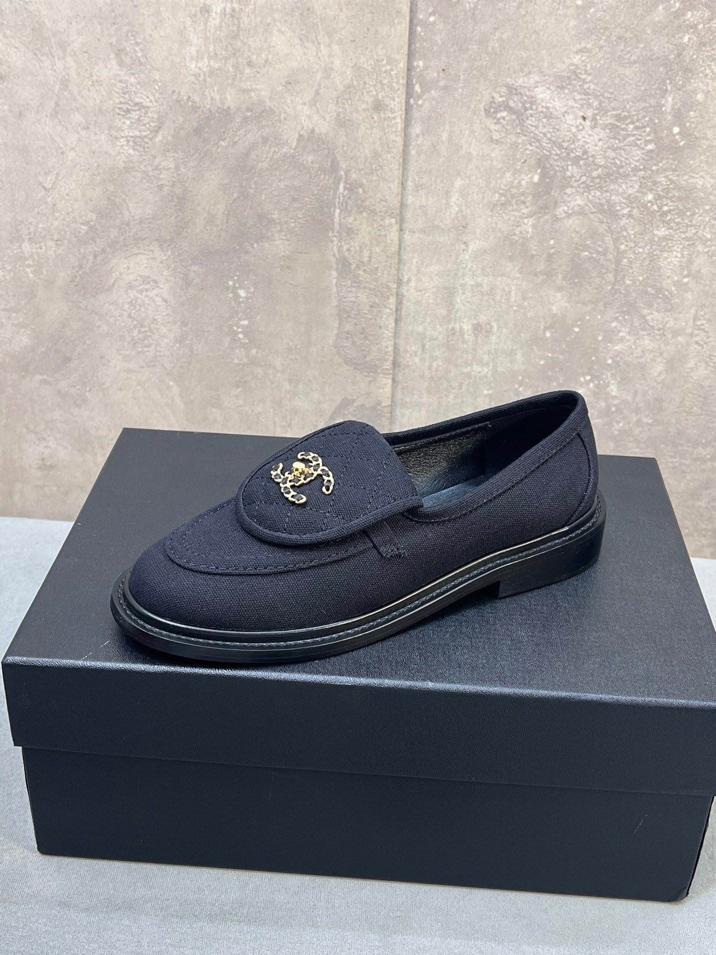 CHANEL 26S LOAFERS IN BLACK CANVAS WITH QUILTED FLAP & CHAIN CC LOGO