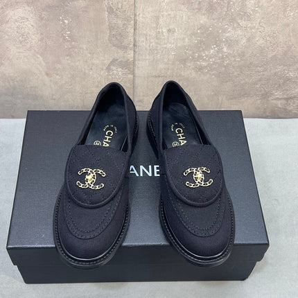 CHANEL 26S LOAFERS IN BLACK CANVAS WITH QUILTED FLAP & CHAIN CC LOGO