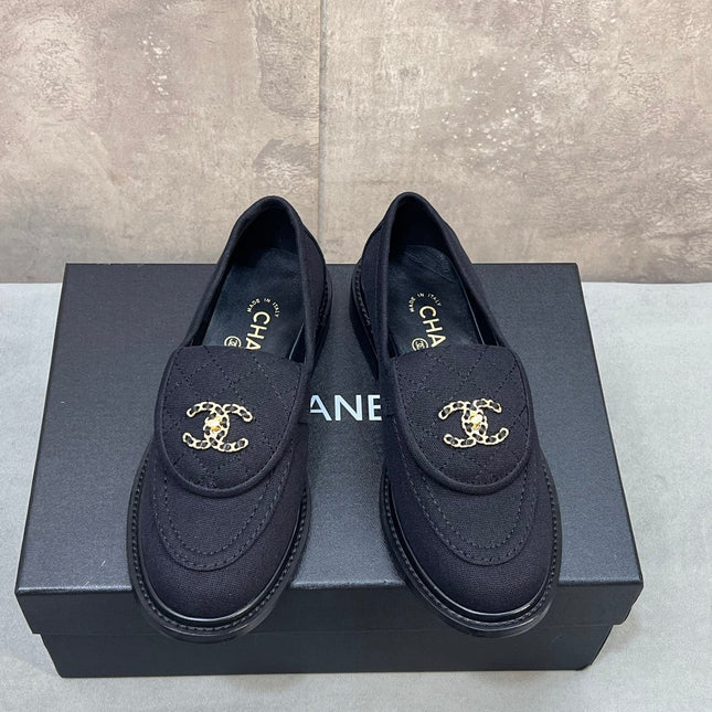 CHANEL 26S LOAFERS IN BLACK CANVAS WITH QUILTED FLAP & CHAIN CC LOGO