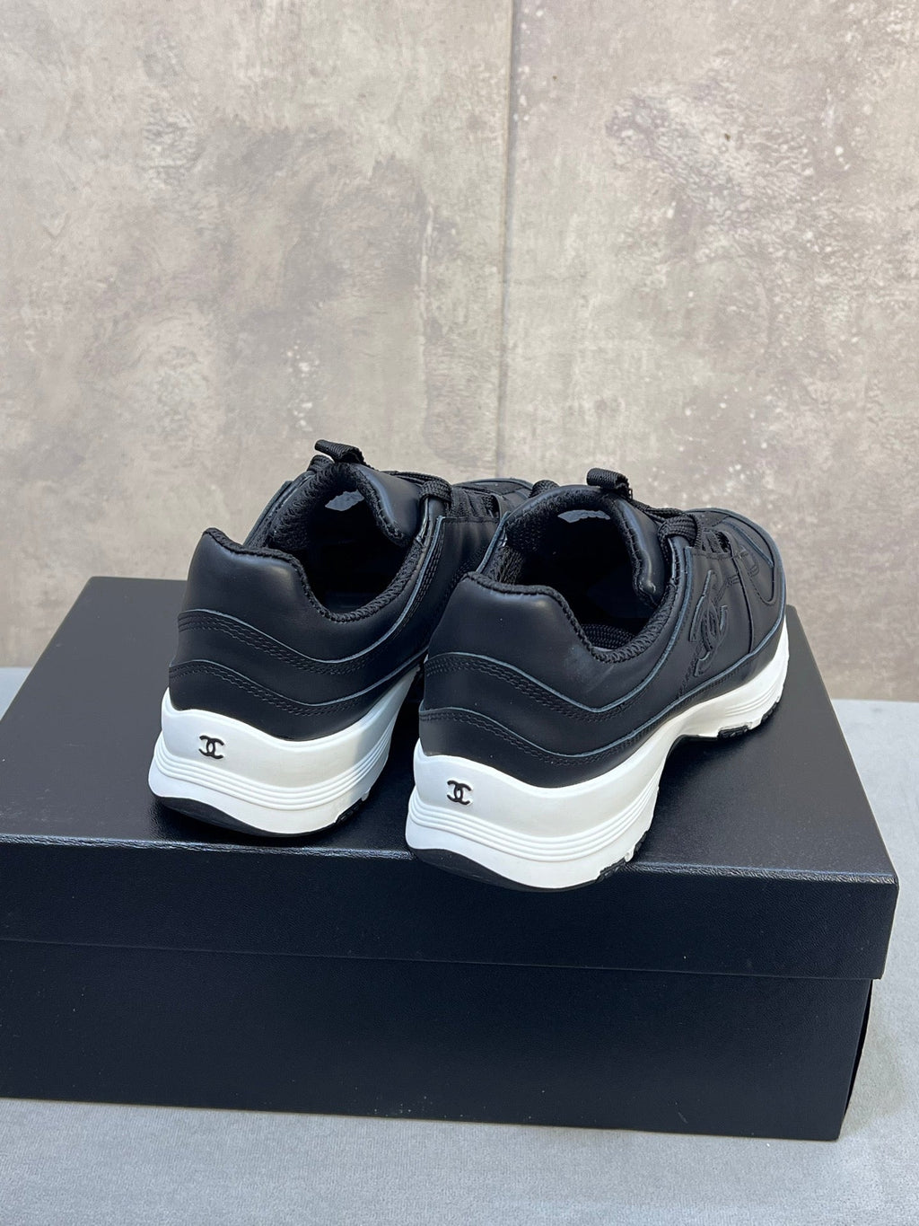 CHANEL 26S RUNNER CC LOGO SNEAKERS IN BLACK CALFSKIN