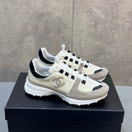 CHANEL 26S RUNNER CC LOGO SNEAKERS IN BEIGE AND GREY CALFSKIN