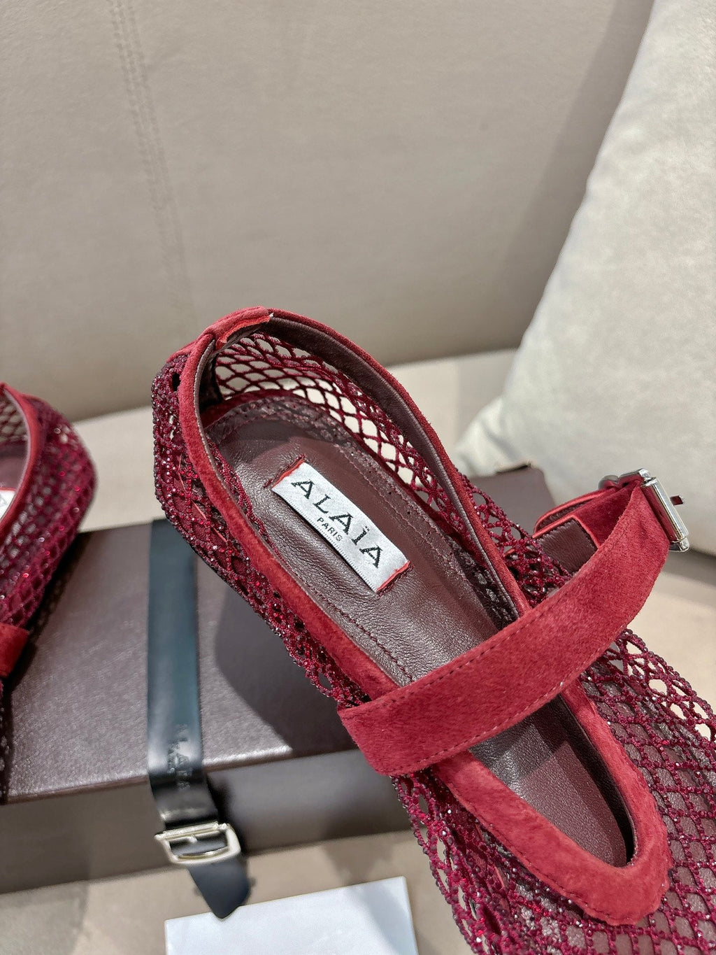 ALAIA 26S MESH FLATS IN DARK RED SUEDE