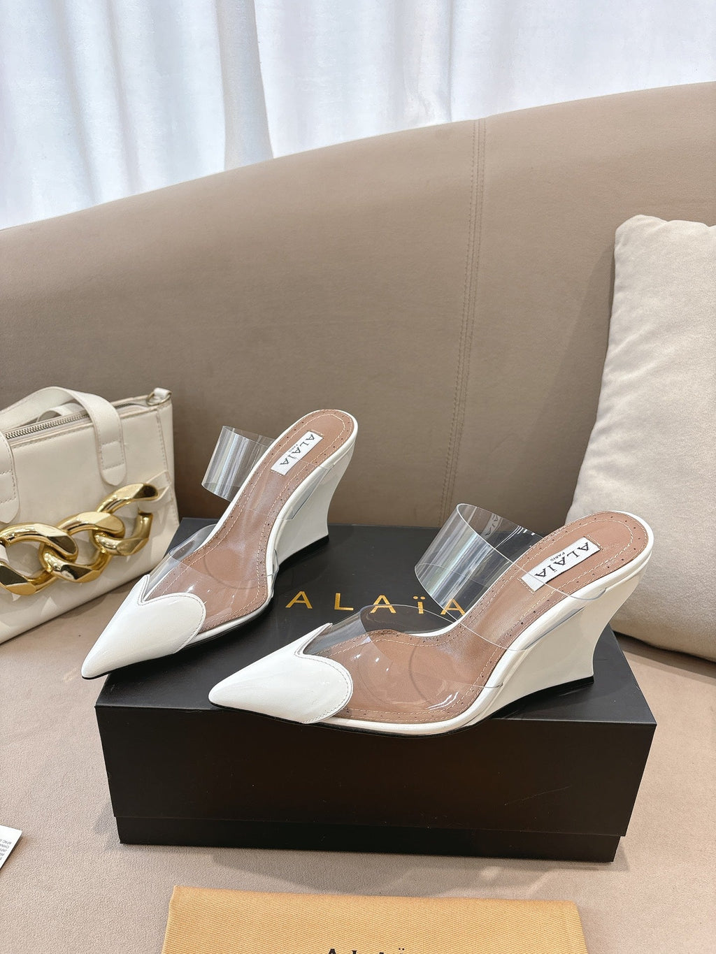 ALAIA 26S HIGH-HEEL WEDGE MULES 95 MM IN WHITE GLOSSY CALFSKIN