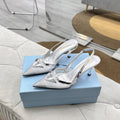 PRADA 25S TRIANGLE LOGO SLINGBACK PUMPS IN SILVER MESH FABRIC