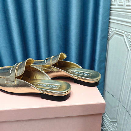 MULES SLIPPERS METALLIC GOLD COWHIDE WITH GOLD COIN