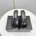 CHANEL 26S BLOCK HEEL SANDALS 100 MM IN BLACK CROCODILE-EMBOSSED CALFSKIN