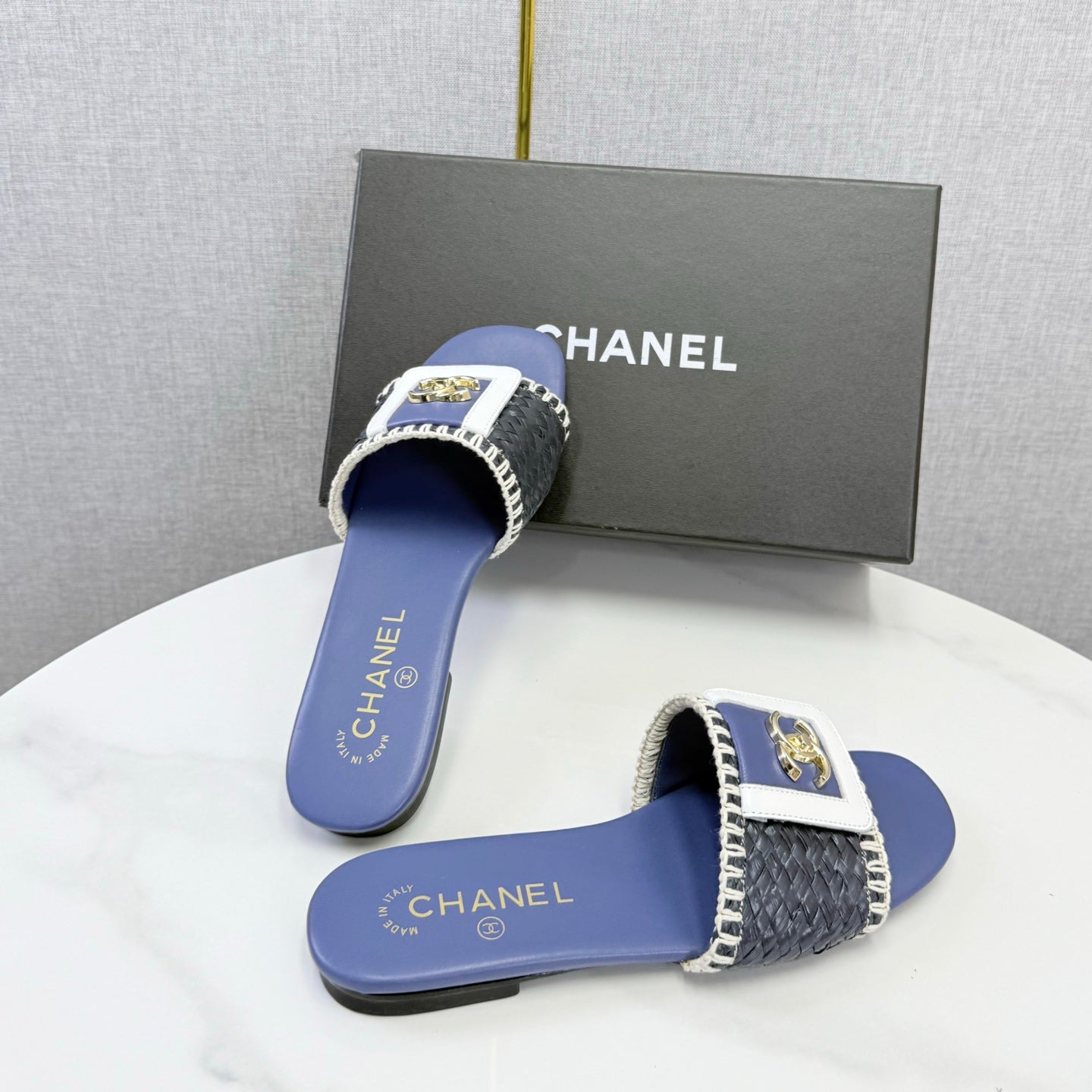 CHANEL 26S WOVEN STRAP SLIDES IN DARK BLUE LAMBSKIN