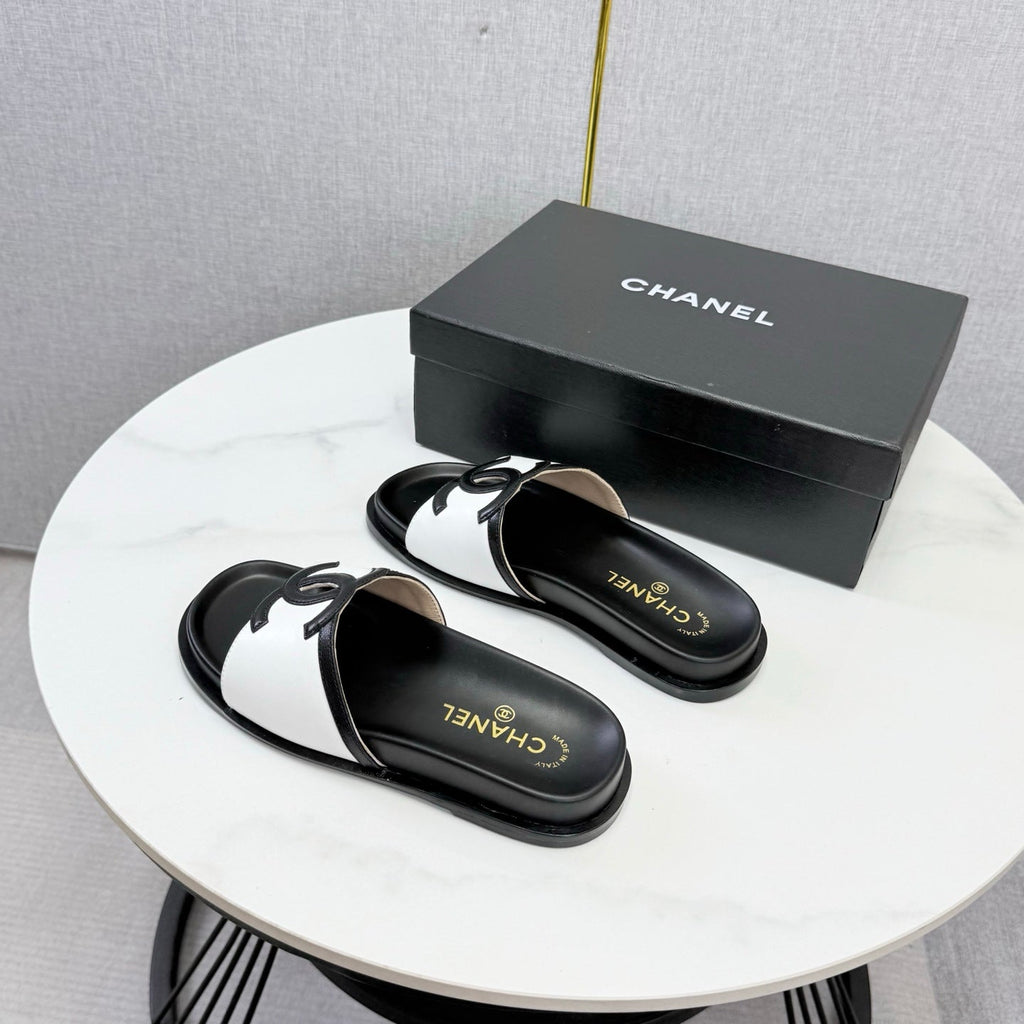 CHANEL 26S ICONIC CC SLIDES IN WHITE LAMBSKIN