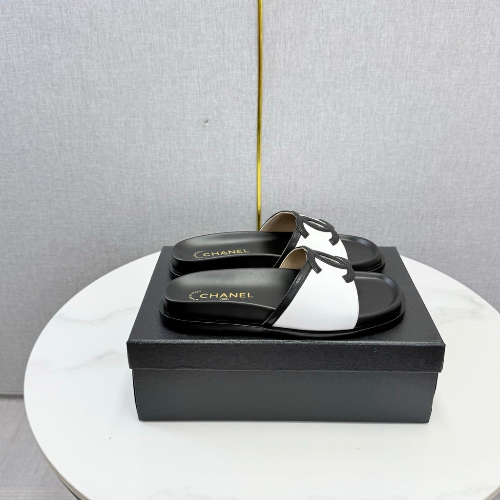 CHANEL 26S ICONIC CC SLIDES IN WHITE LAMBSKIN