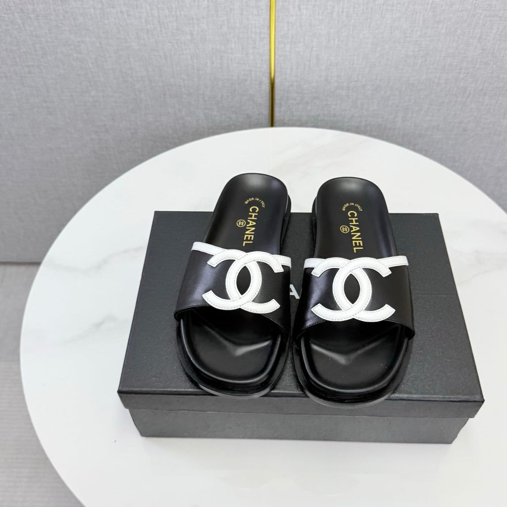 CHANEL 26S ICONIC CC SLIDES IN BLACK LAMBSKIN