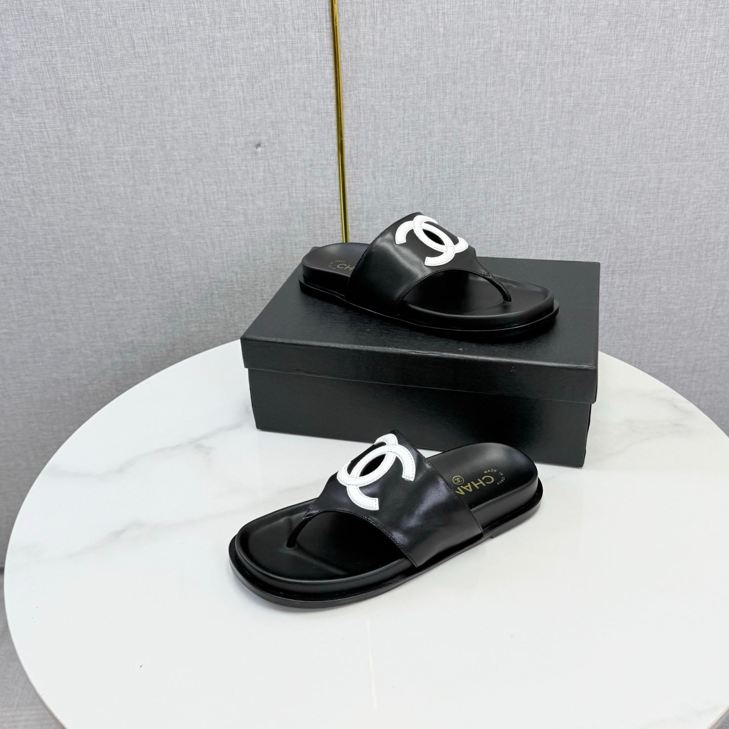 CHANEL 26S CC THONG SLIDES IN BLACK LAMBSKIN