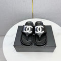 CHANEL 26S CC THONG SLIDES IN BLACK LAMBSKIN