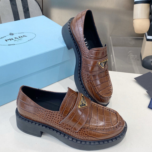 PRADA 26S LOAFERS IN DARK BROWN CROCODILE PRINT CALFSKIN