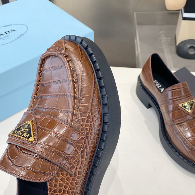 PRADA 26S LOAFERS IN DARK BROWN CROCODILE PRINT CALFSKIN