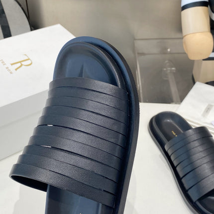 THE ROW 26S MULTI STRAP SLIDES IN BLACK CALFSKIN