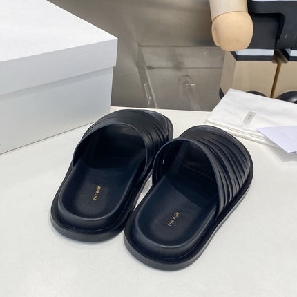 THE ROW 26S MULTI STRAP SLIDES IN BLACK CALFSKIN