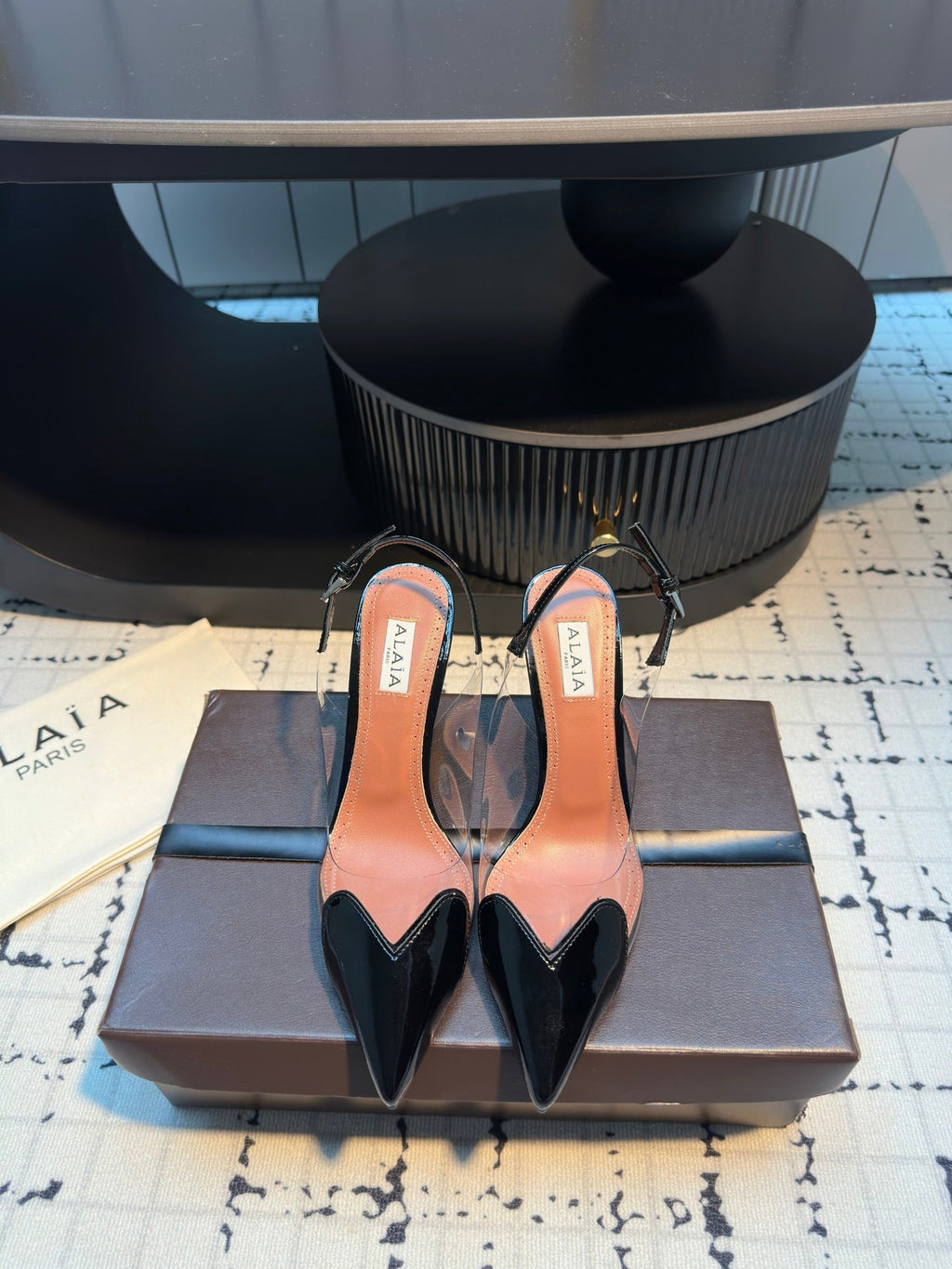 ALAIA HIGH SLINGBACK 25S 90 MM IN BLACK CALFSKIN