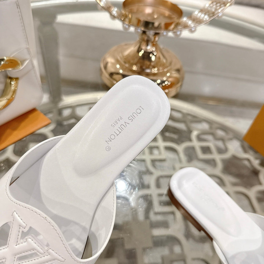 ISOLA FLAT SLIDE IN WHITE CALFSKIN