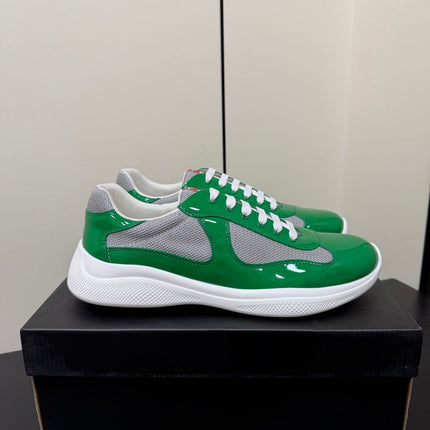 PRADA 26S SNEAKERS IN GREEN PATENT CALFSKIN AND WHITE MESH