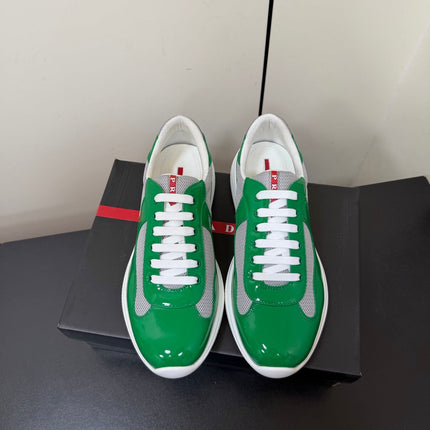 PRADA 26S SNEAKERS IN GREEN PATENT CALFSKIN AND WHITE MESH